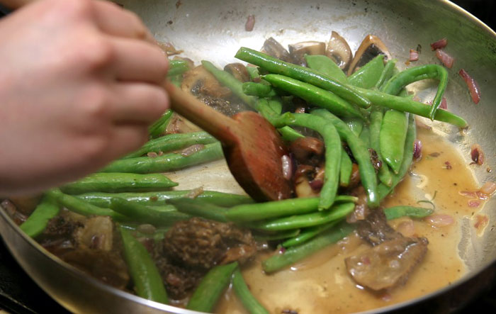 family meal cooking in a pan