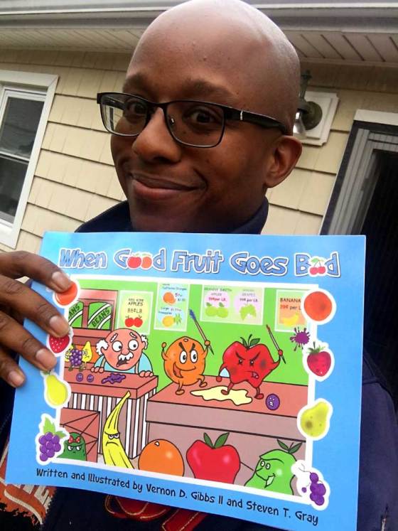 vernon gibbs ii holds a copy of his new children's book "when good fruit goes bad"